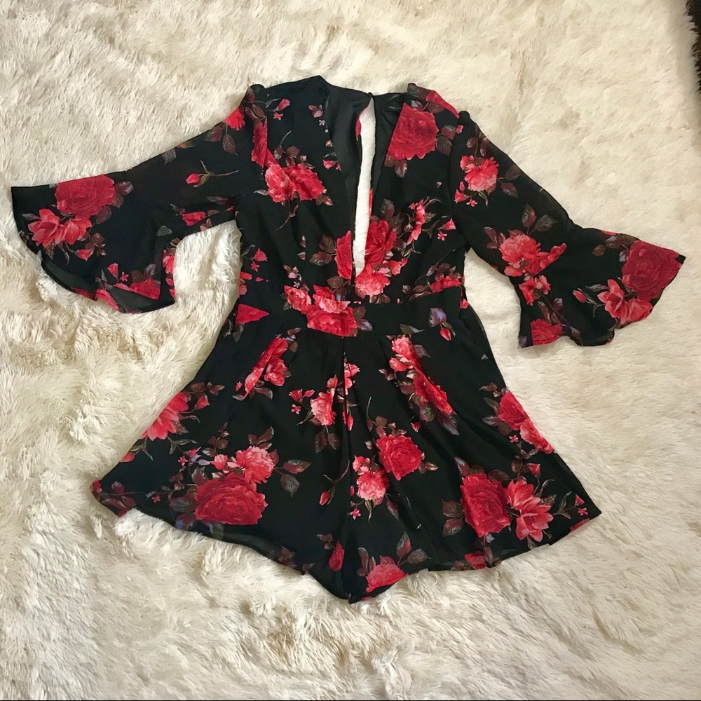 SHORT BLACK AND RED FLOWER WRAP ROMPER